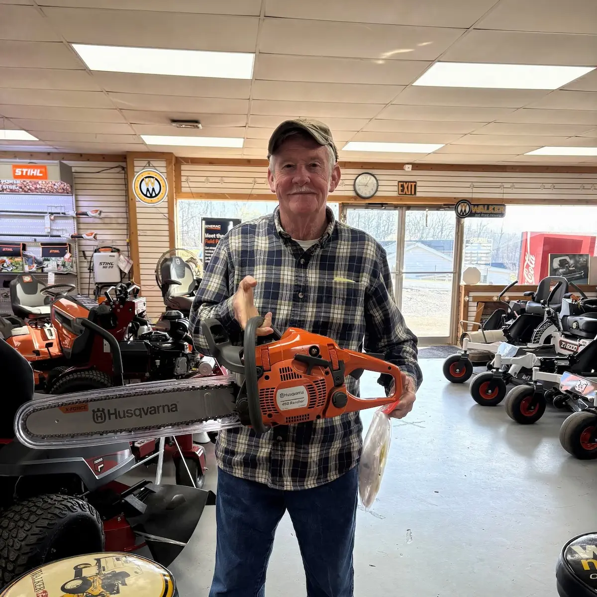 Customer with a Husqvarna chainsaw